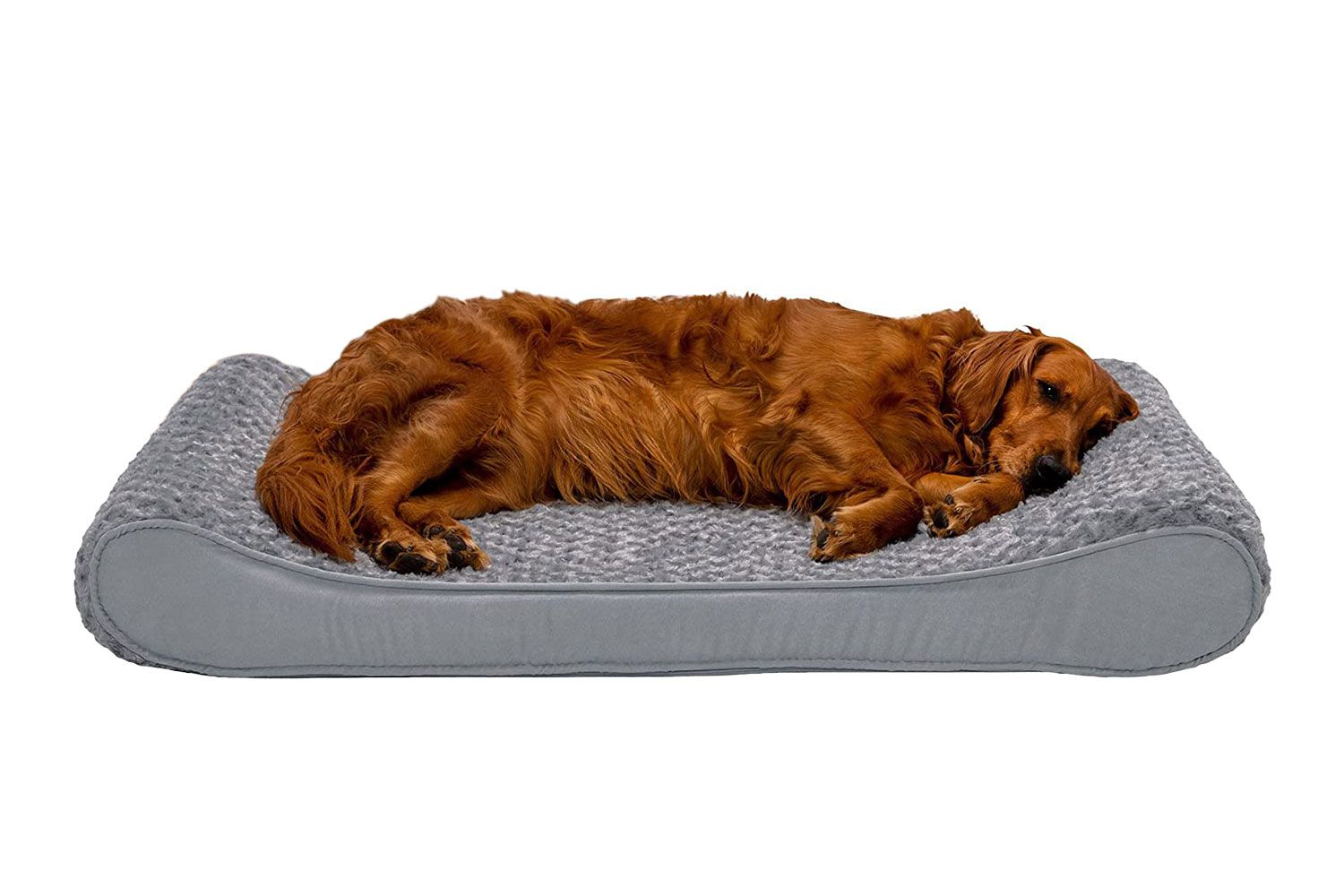 A dog laying down on the FurHaven Pet Orthopedic Ultra Plush Lounger