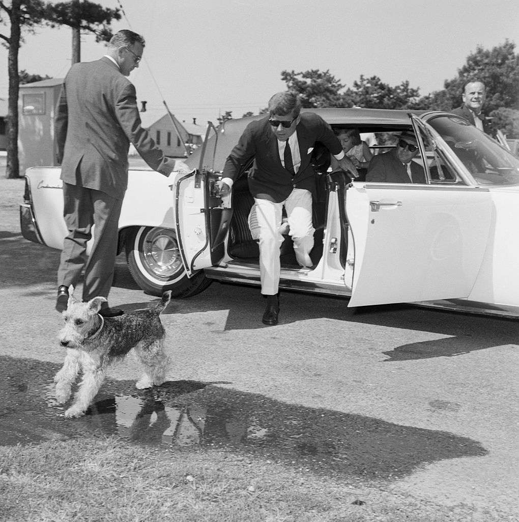 President John F. Kennedy with his Welsh Terrier, Charlie