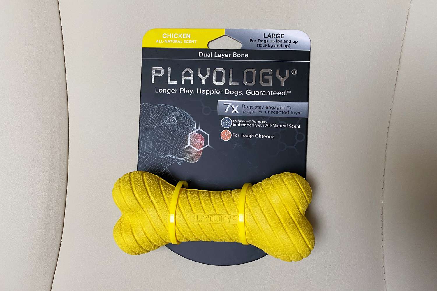 The Playology Dual Layer Bone Dog Toy in its original packaging